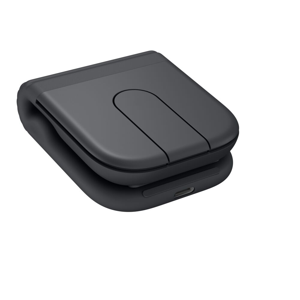 Un dispositivo negro plegado con un diseño en forma de U en su superficie superior.