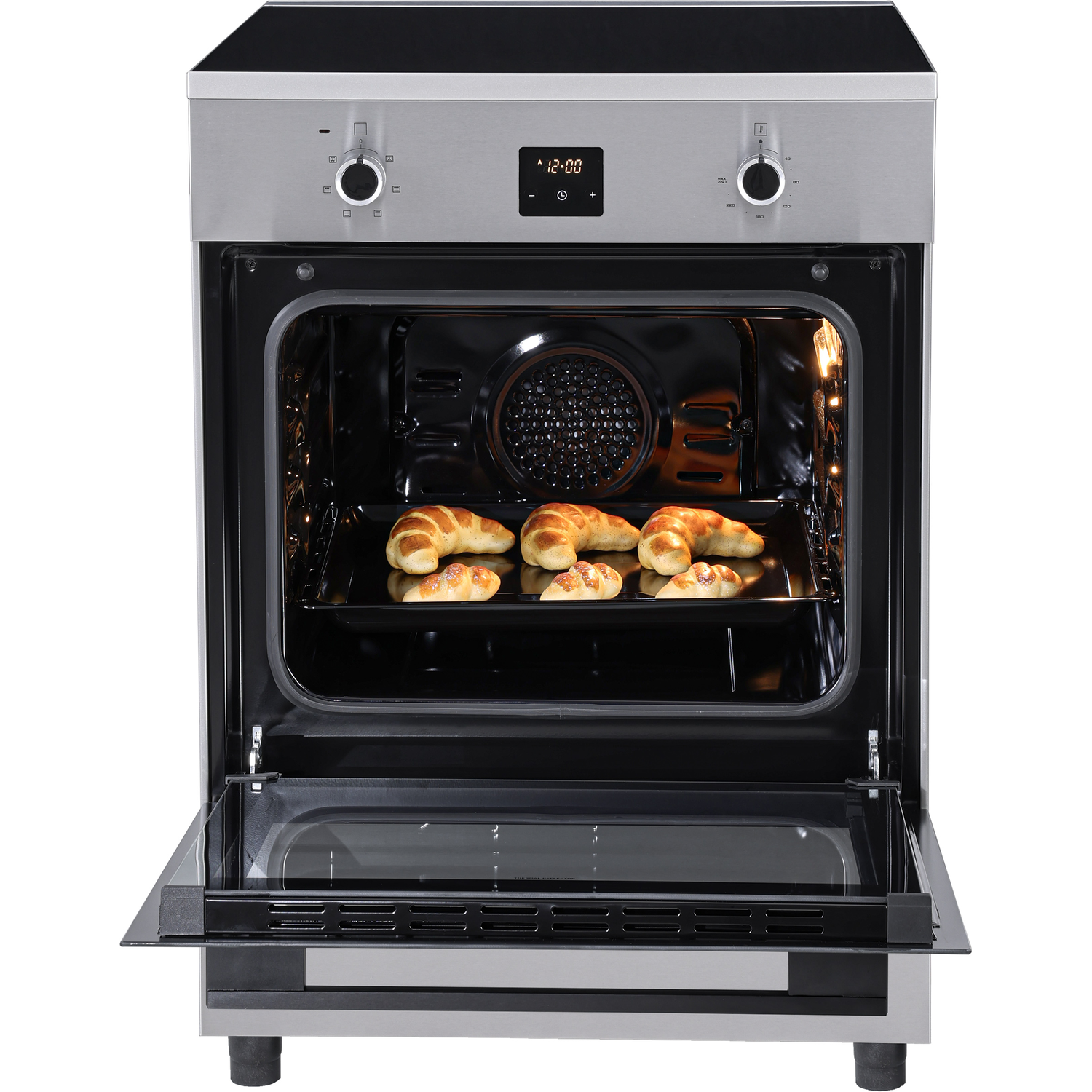 Een open roestvrijstalen oven met vier goudbruine croissants die erin bakken.