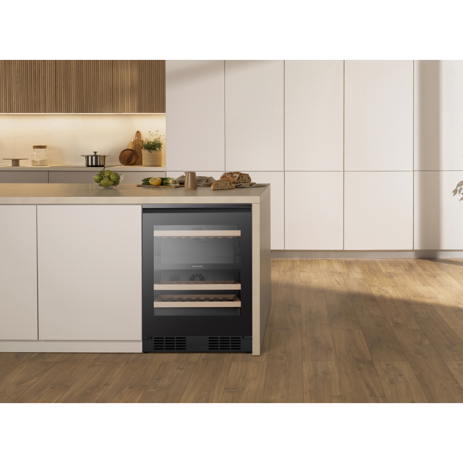 A modern wine cooler in a minimalist kitchen with wood accents.