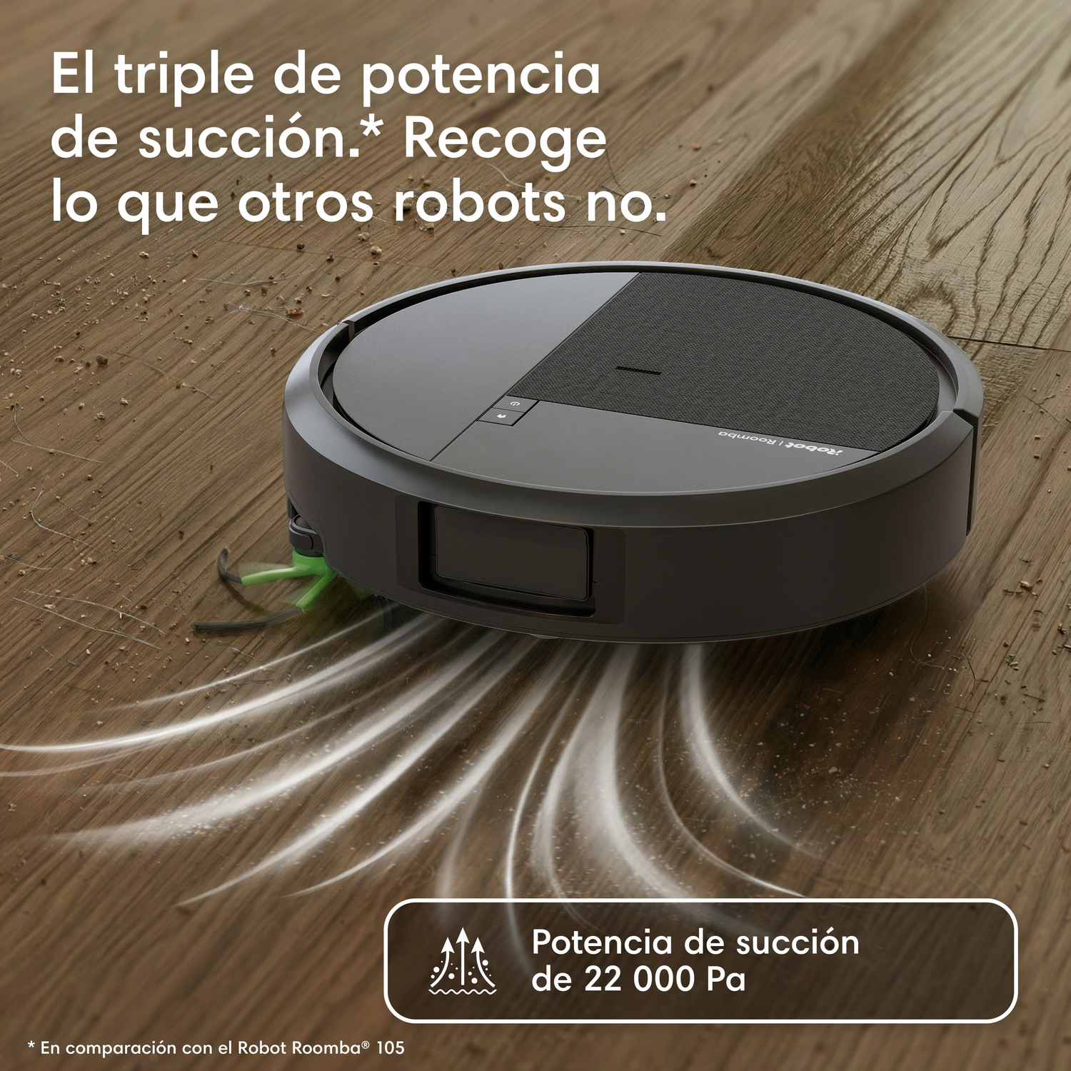 Un robot aspirador oscuro limpia partículas de suciedad de un suelo de madera.