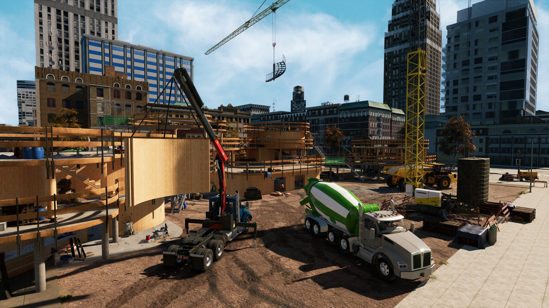 Baustelle mit Kränen, Zementmischer, Lastwagen und Gebäuden im Hintergrund.