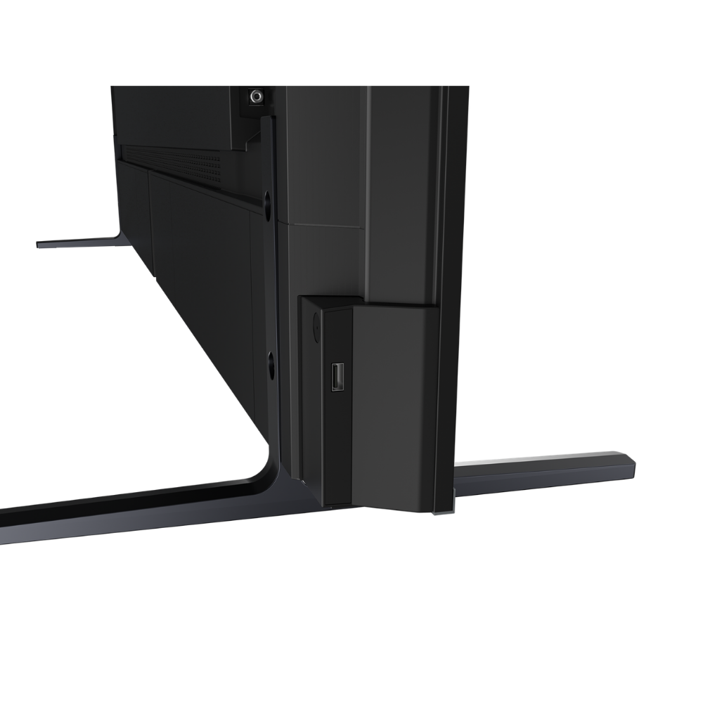 Primer plano de la parte inferior derecha de un televisor negro que muestra un puerto USB.