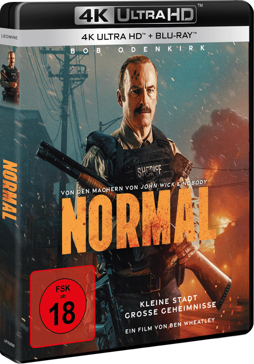 Ein Mann in einer Sheriff-Weste hält eine Schrotflinte. "Normal" Filmplakat.