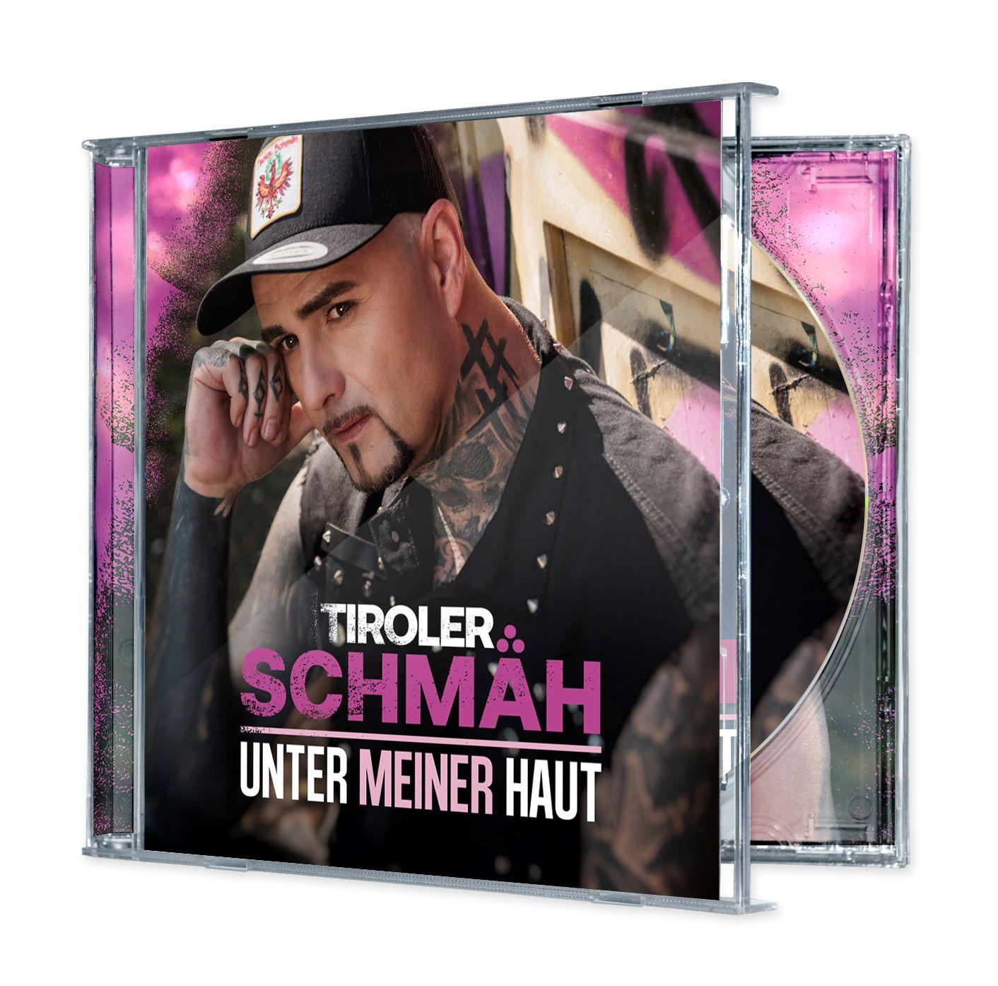 CD-Cover mit tätowiertem Mann, der eine Kappe und eine Weste trägt.
