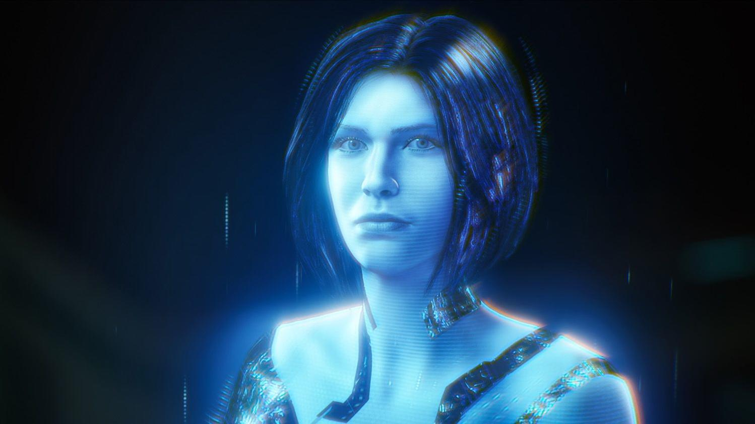 Eine holografische Frau mit blauen Haaren und Kleidung auf dunklem Hintergrund.
