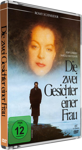 DVD-Cover: Frauengesicht über Mann auf Strand, Titel 'Die zwei Gesichter einer Frau'.