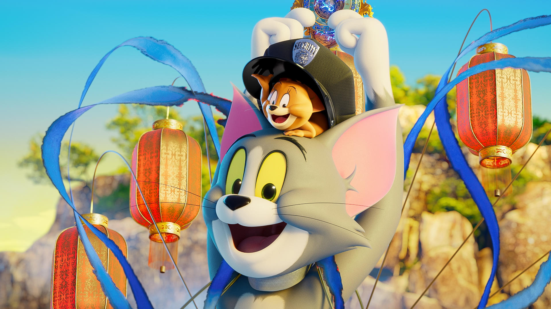 Tom und Jerry mit Laternen und blauen Bändern im Freien