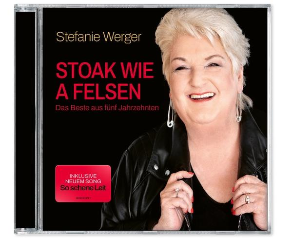 Stefanie Werger mit Album "Stoak wie a Felsen". Schwarzer Hintergrund, sie trägt Lederjacke.