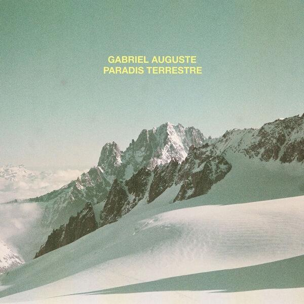 Schneebedeckte Berge im Sonnenlicht mit dem Text „Gabriel Auguste Paradis Terrestre“.