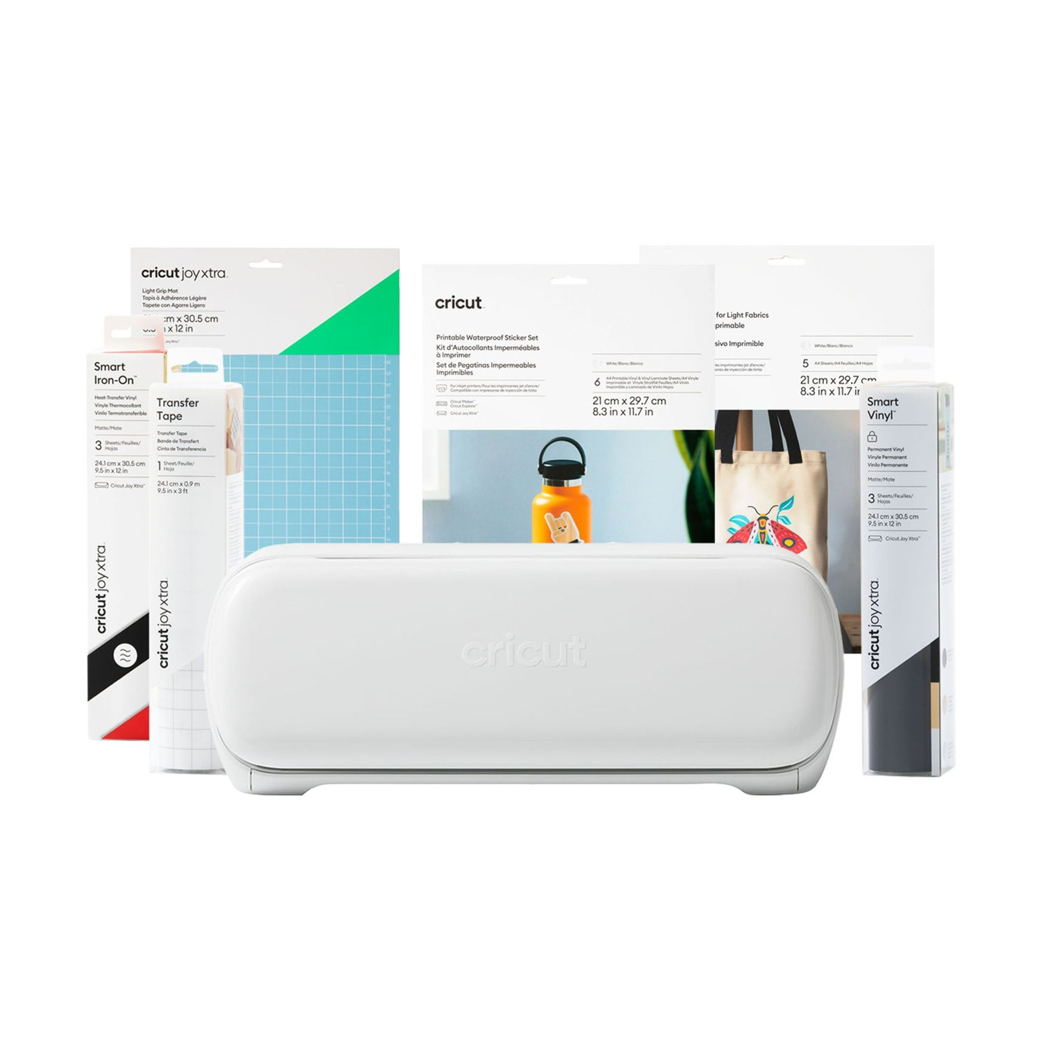 Una macchina da taglio Cricut Joy Xtra bianca circondata da vari materiali di artigianato come vinile e adesivi.