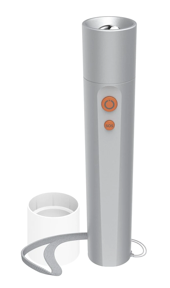Srebrny cylinder z dwoma pomarańczowymi przyciskami i białą nakładką obok.