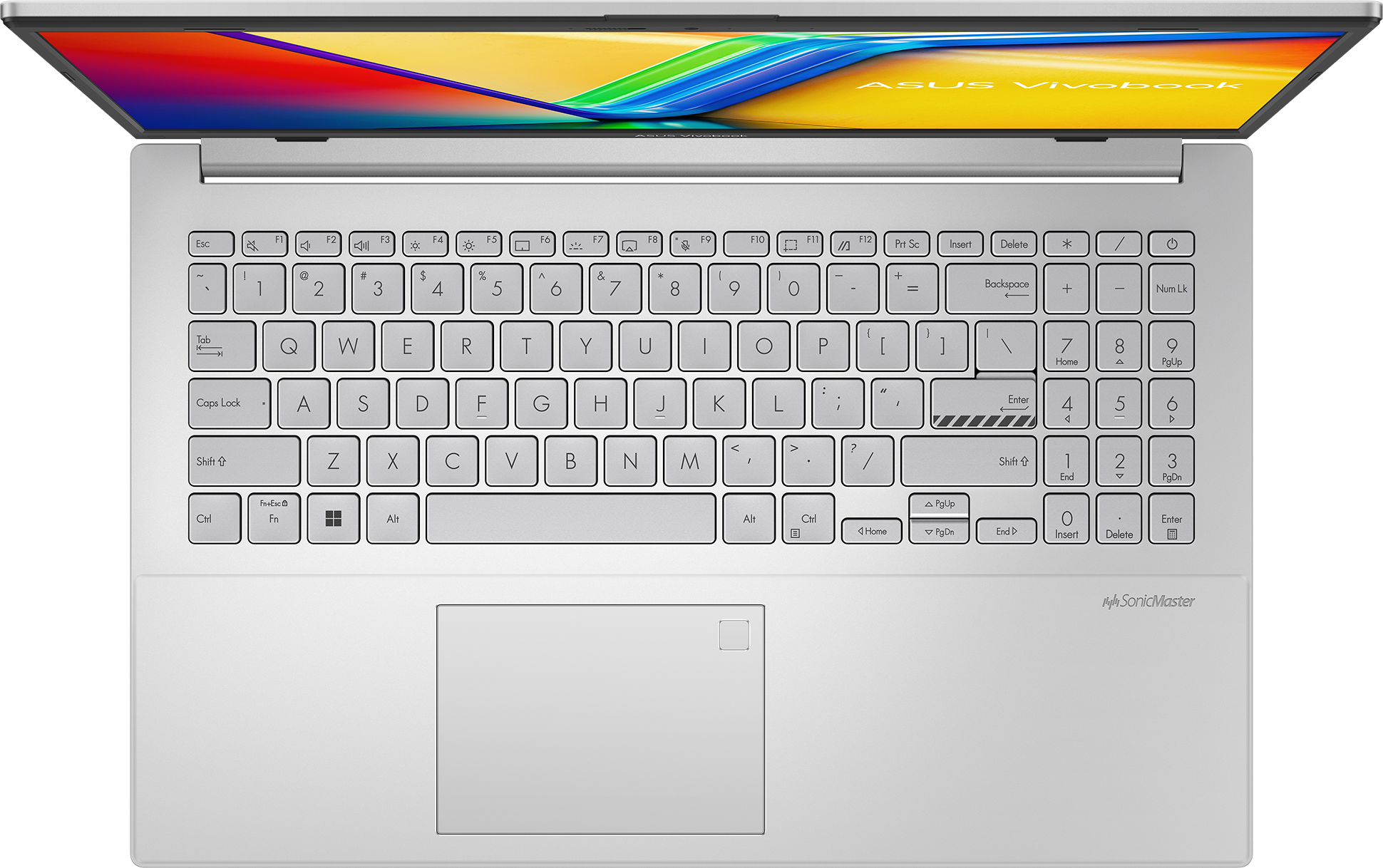 Egy nyitott ezüst laptop színes, megvilágított képernyővel és billentyűzettel.