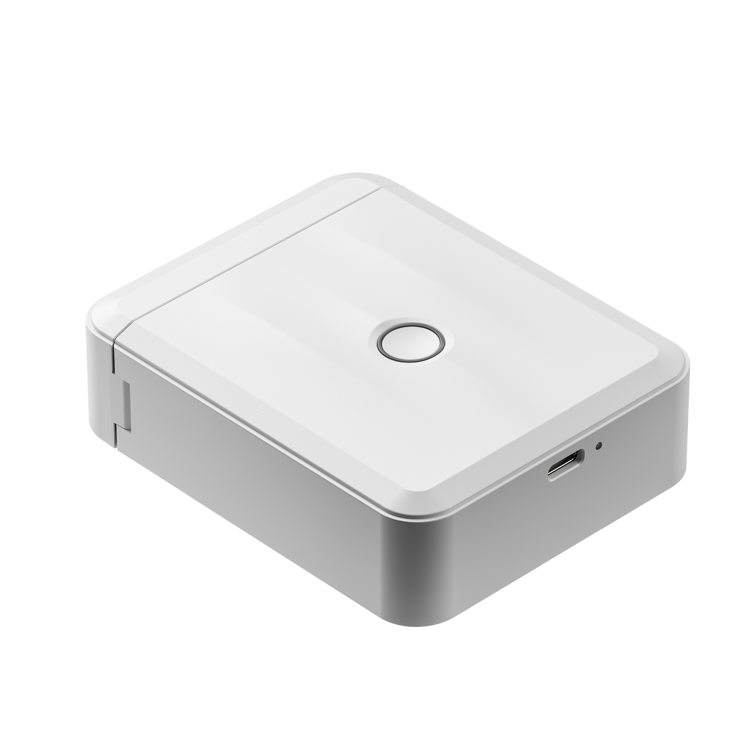 Ein weißes rechteckiges Gerät mit einem Kreis auf der Oberseite und einem USB-Anschluss.