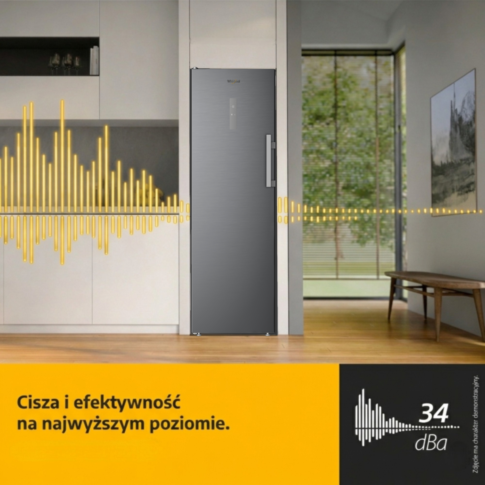 Szara lodówka w nowoczesnej kuchni z żółtymi grafikami fal dźwiękowych.