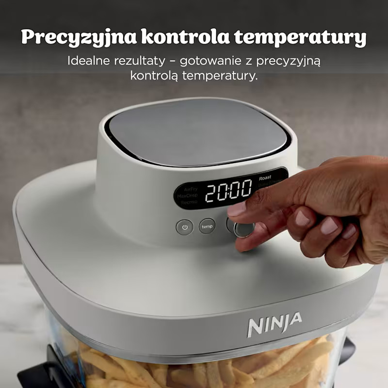 Dłoń kręci pokrętłem na jasnoszarym Airfryerze Ninja z wyświetlonym czasem 20:00.