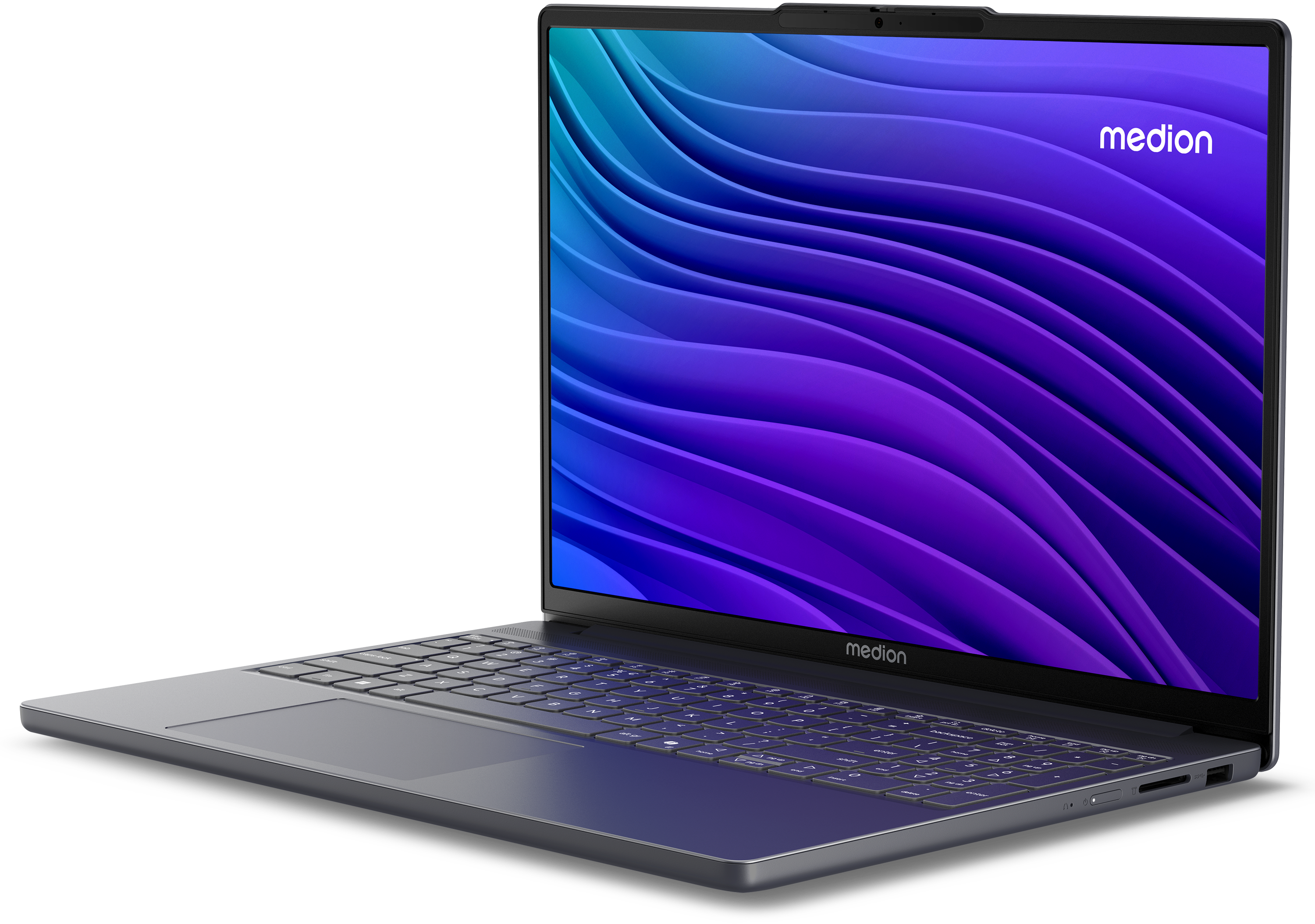 Een grijze Medion laptop met verlicht toetsenbord en golvende bureaubladachtergrond.
