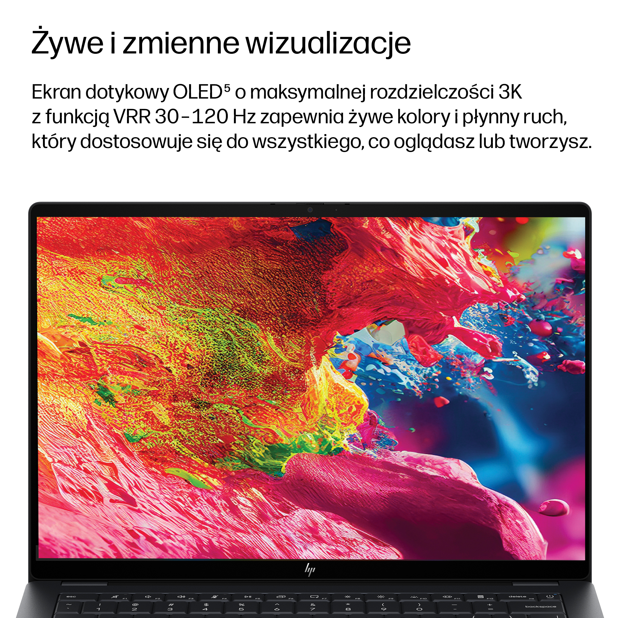 Laptop z żywym, abstrakcyjnym wygaszaczem ekranu i widoczną klawiaturą.