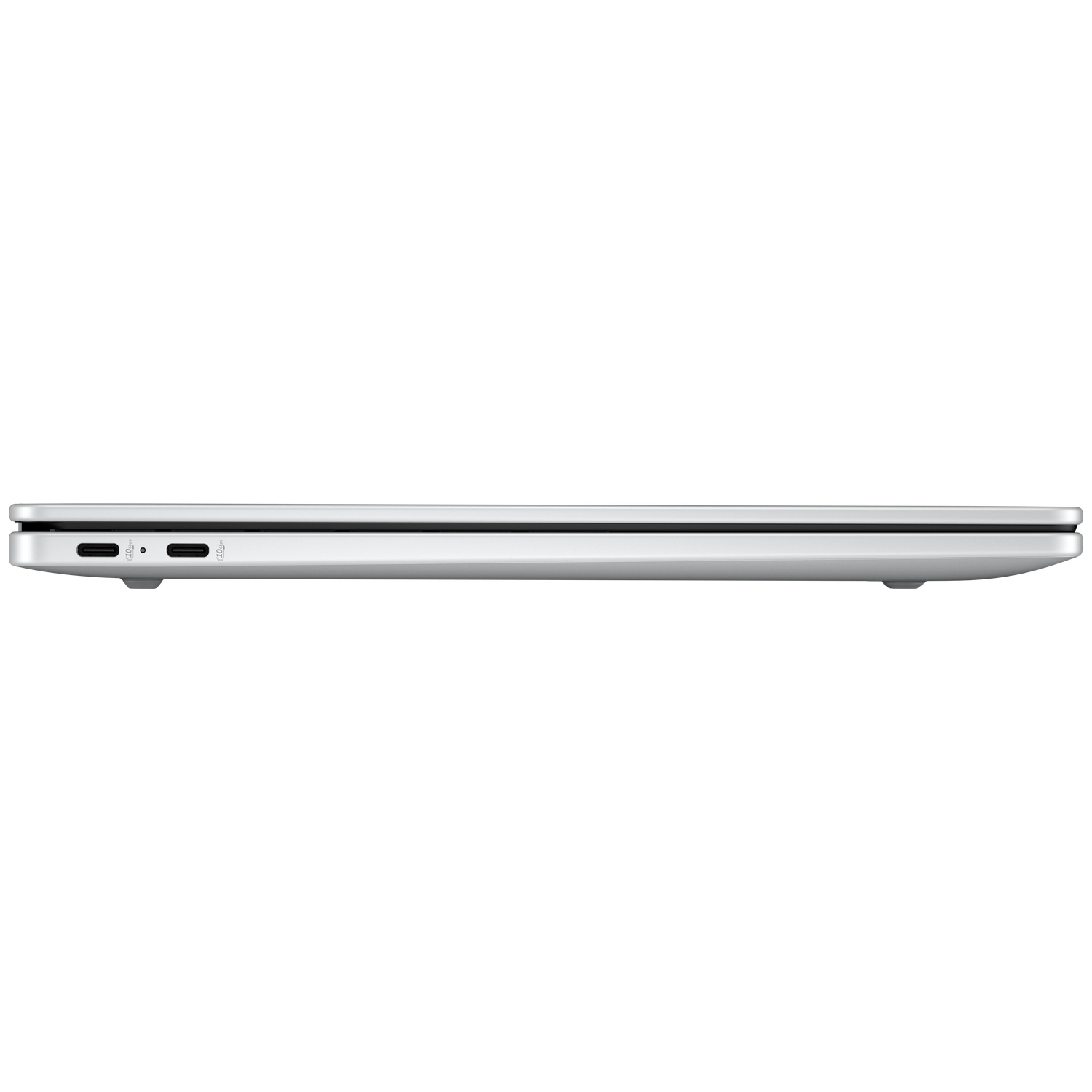 Un ordinateur portable argenté fermé vu de profil avec des ports USB-C visibles.
