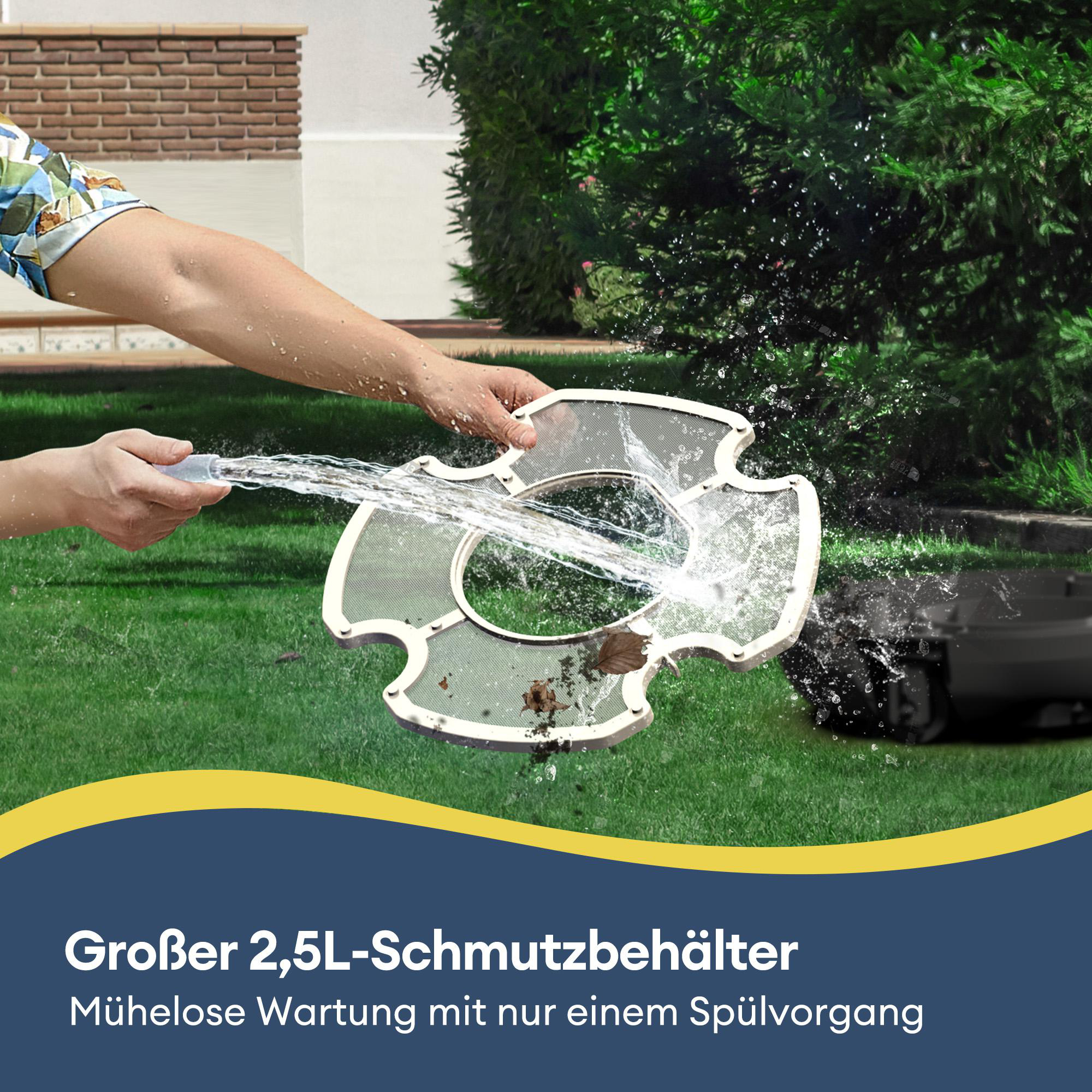 Wasser spült einen Filter auf grünem Rasen vor einem Busch.