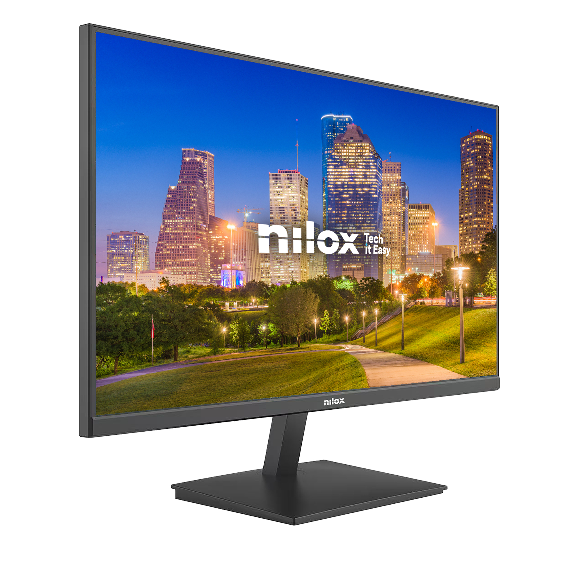Un monitor muestra un paisaje urbano nocturno con luces y árboles.