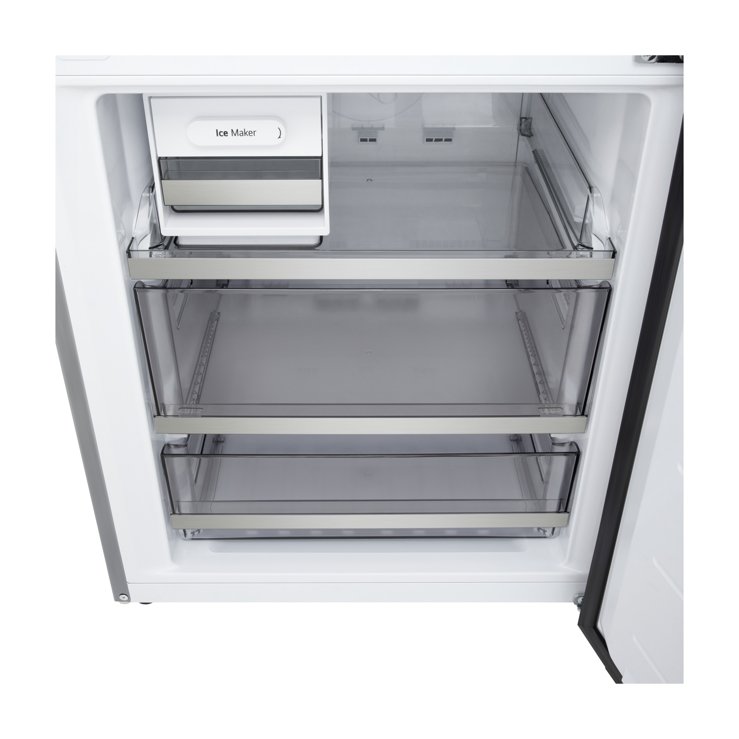 Vista interna di un frigorifero vuoto con ice maker e due cassetti.