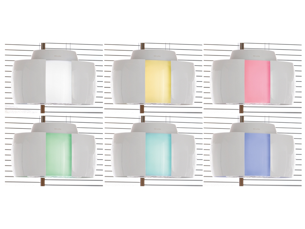 Sechs weiße Dunstabzugshauben mit unterschiedlichen Farb-LEDs: weiß, gelb, rosa, grün, blau, lila.
