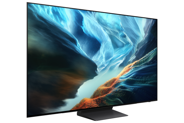 Modern bir TV, mavi ve turuncu kaya oluşumlarına sahip gerçeküstü bir manzara gösteriyor.