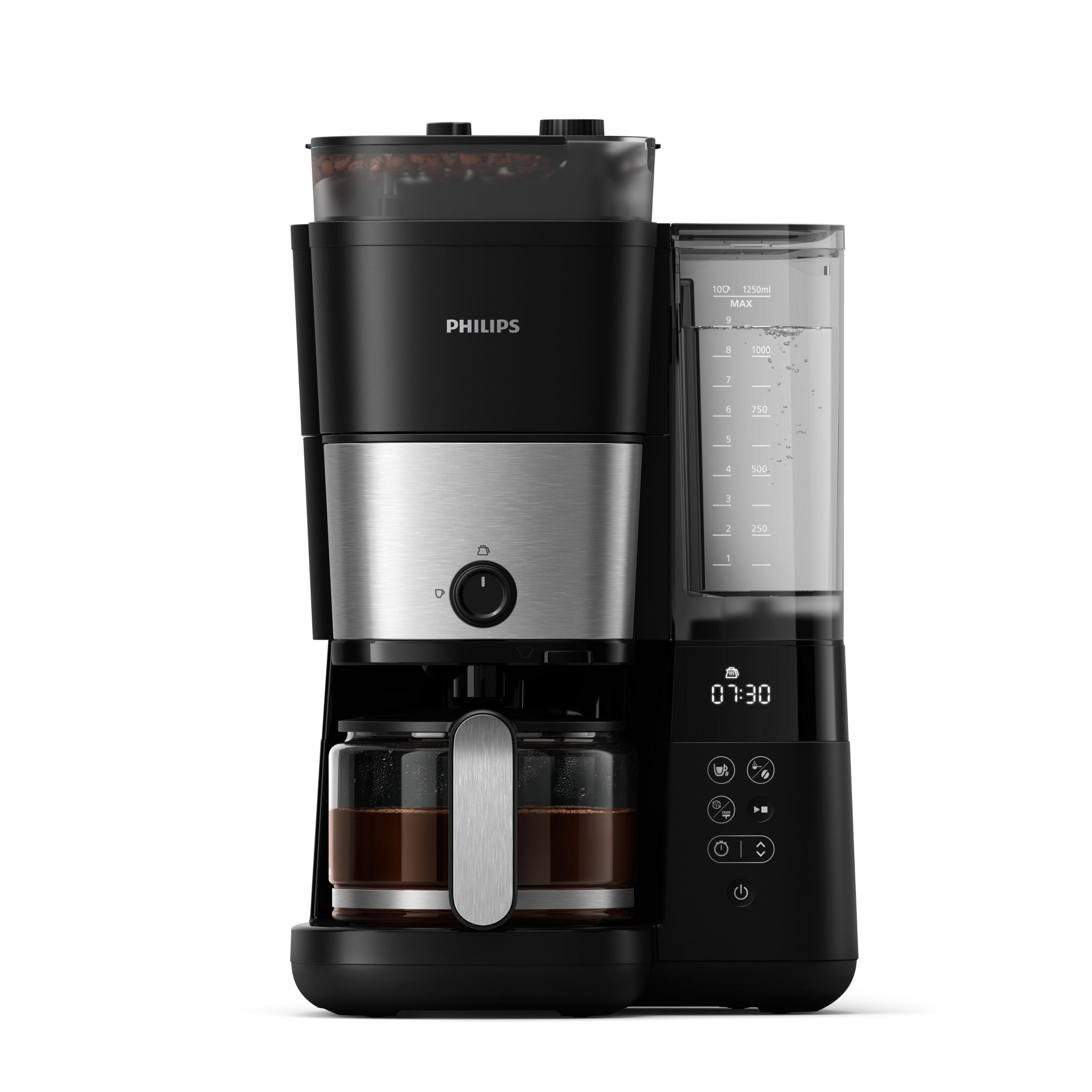 Schwarze Philips Kaffeemaschine mit zwei Glaskaraffen, Wasserbehälter und Kaffeebohnen.