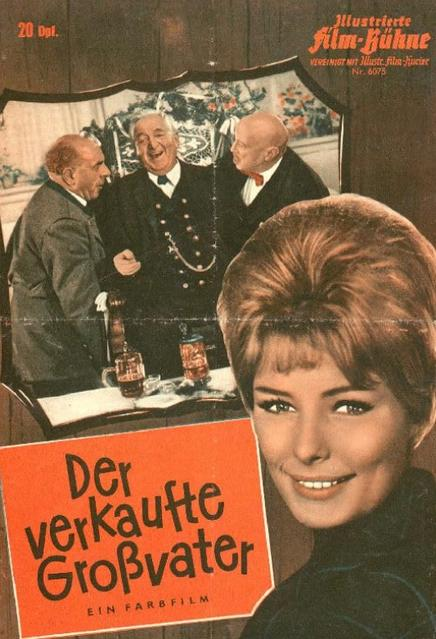 Drei Männer in Anzügen, eine Frau im Vordergrund, ein Filmtitel.