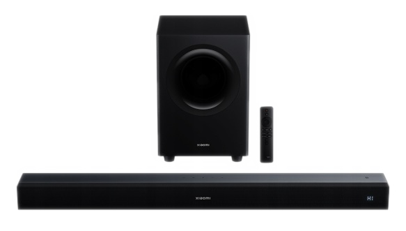 Czarny subwoofer, soundbar i pilot na czarnym tle.