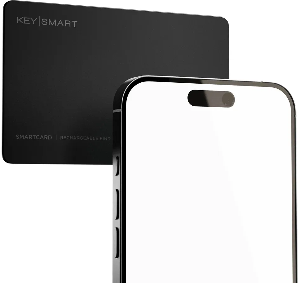 Schwarze Key Smart Karte und ein Smartphone mit leerem Bildschirm.