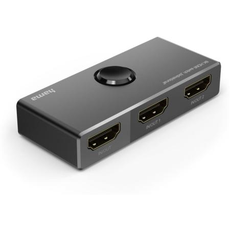 Conmutador HDMI 8K gris con una entrada y dos salidas. Tiene un botón.