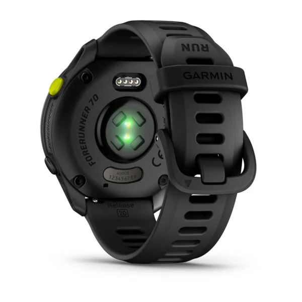 Fekete Garmin Forerunner 70 óra hátlap zöld pulzusmérővel és töltőérintkezőkkel.