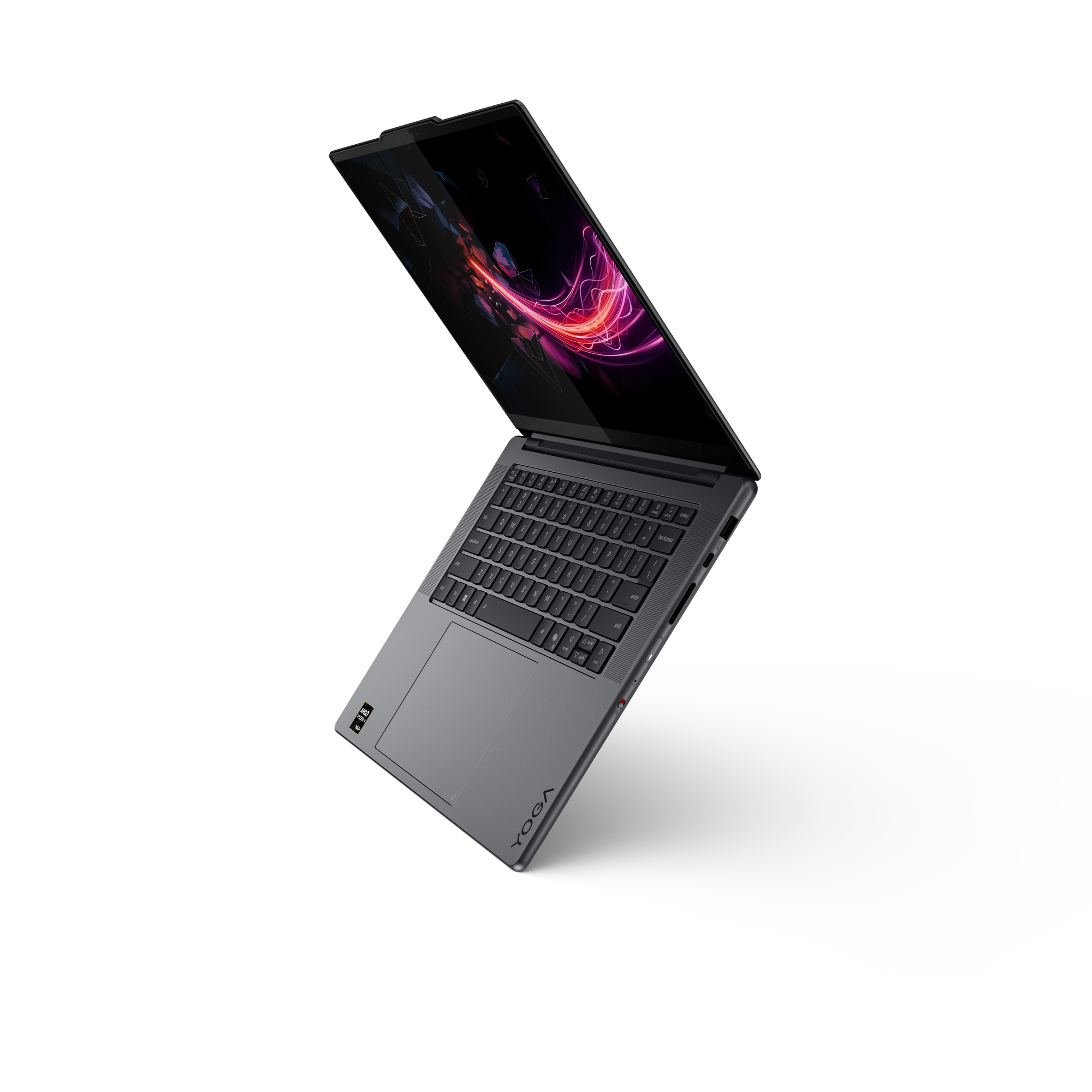 Grauer Laptop mit leuchtendem Bildschirm und Tastatur vor schwarzem Hintergrund.