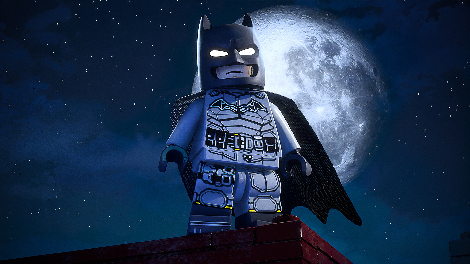 Ein Lego Batman steht auf einem Dach vor dem Mond und Sternen.
