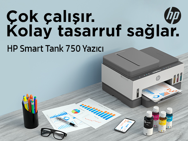 HP Smart Tank 750 yazıcı, belgeli bir masada mürekkep şişeleriyle birlikte.