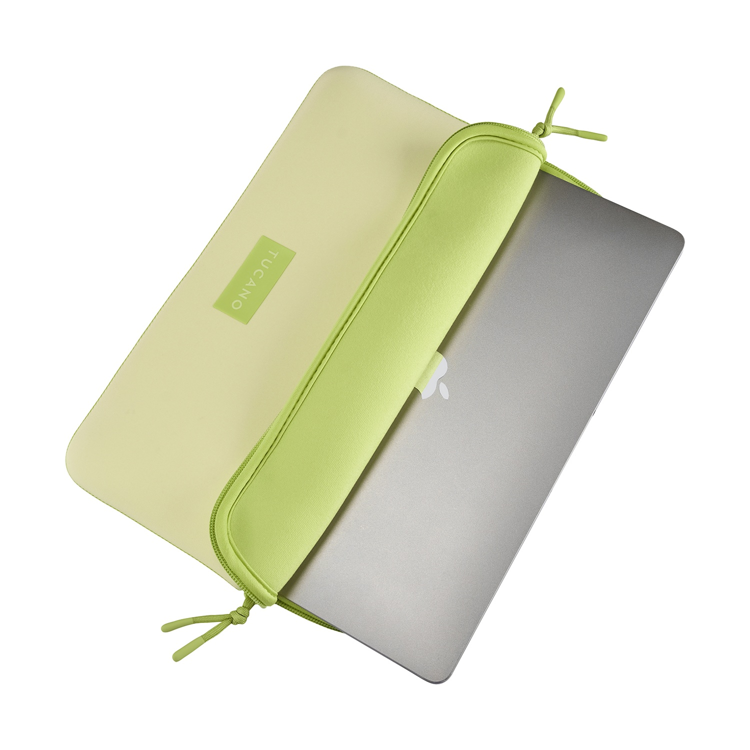Una custodia verde chiaro per laptop con un laptop argento all'interno.
