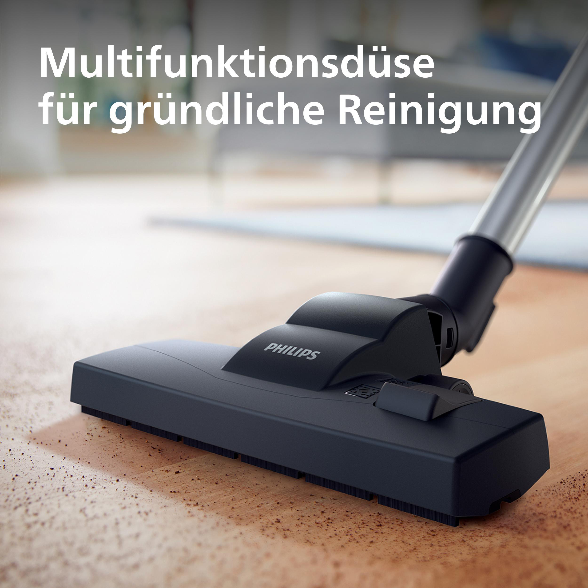 Dunkler Staubsaugerkopf mit Philips-Logo auf Holzboden.