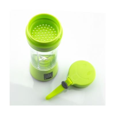 Un minipimer verde con recipiente transparente y tapa sonriente.