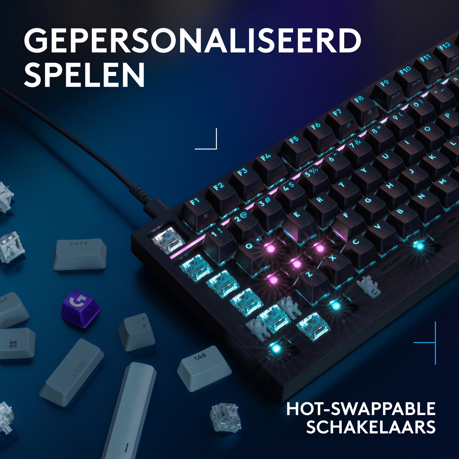 A keyboard with illuminated keys and loose keycaps scattered around.