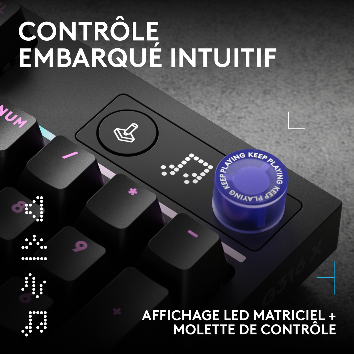 Clavier noir avec bouton rotatif bleu et écran LED.