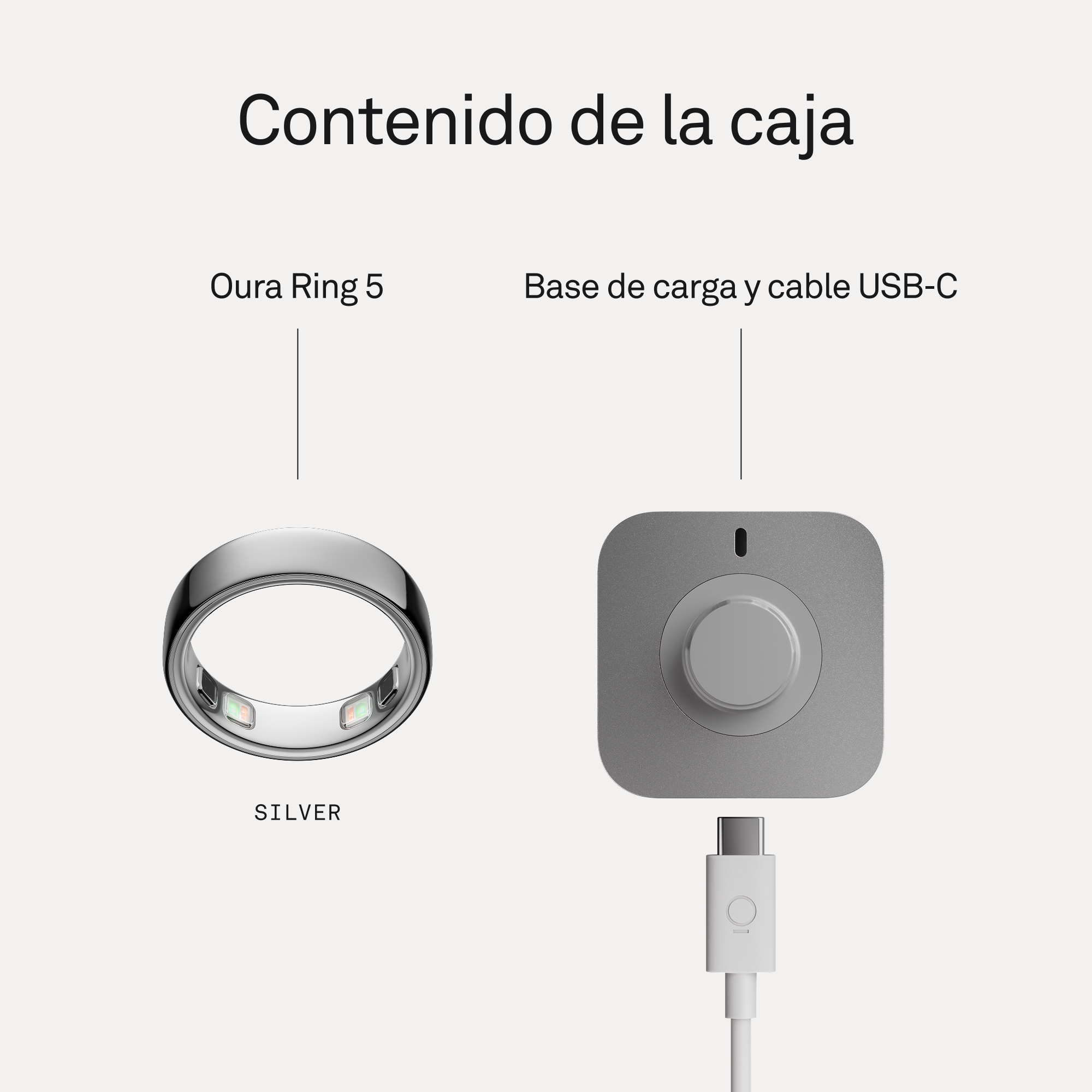 Un anillo plateado y una base de carga gris con cable USB-C.