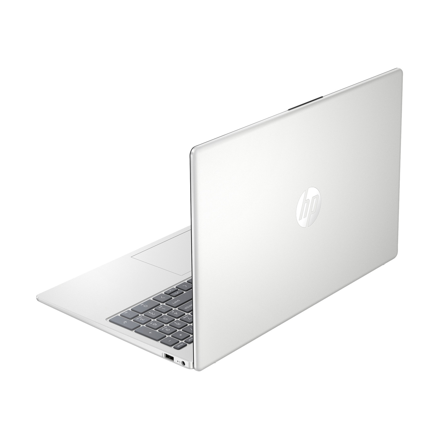Un laptop HP argentato, visto da dietro e angolato a sinistra, con tastiera illuminata.