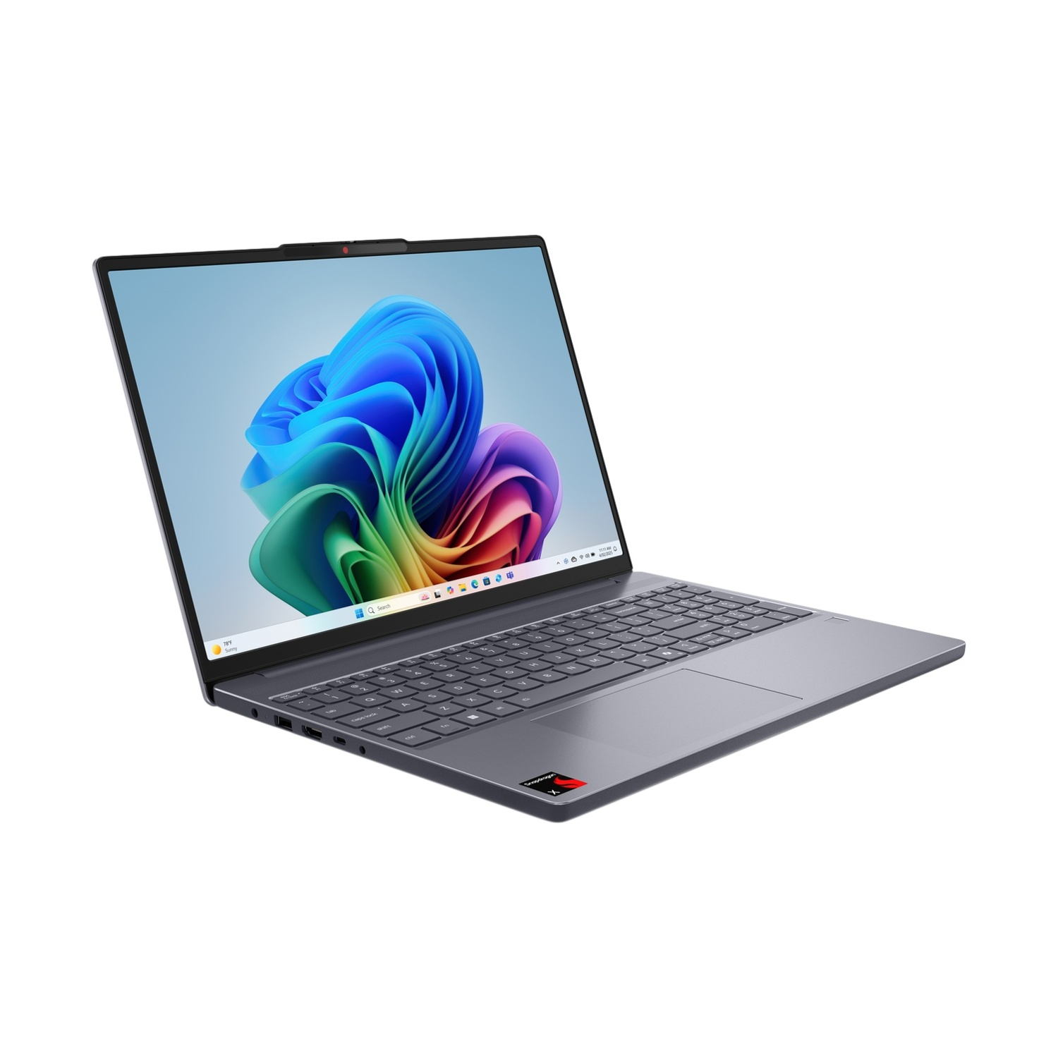 Un laptop grigio aperto mostra uno sfondo astratto colorato sullo schermo.