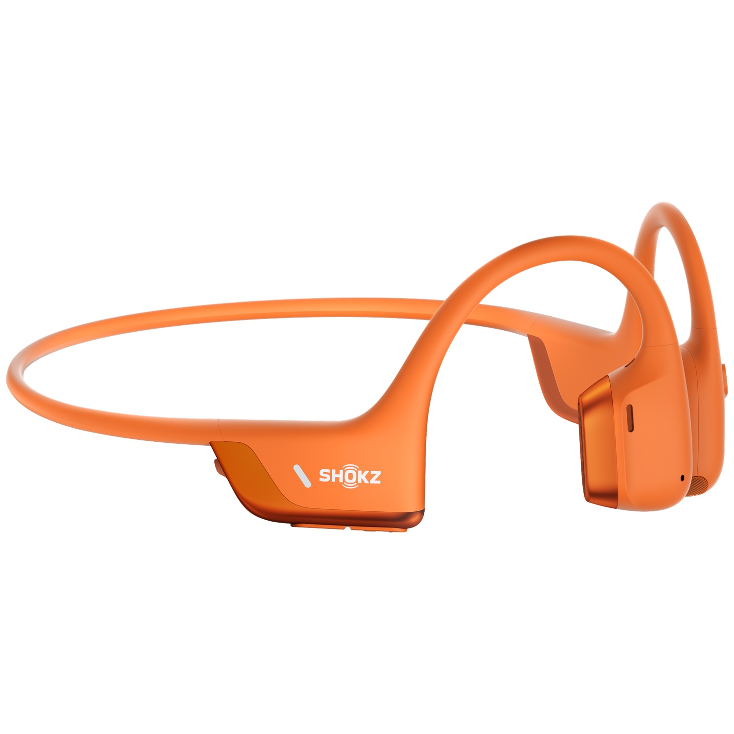 Oranje Shokz koptelefoon met hoofdbandontwerp, op witte achtergrond.