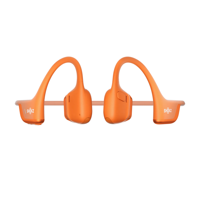 Pomarańczowe słuchawki z opaską i logo SHOKZ.