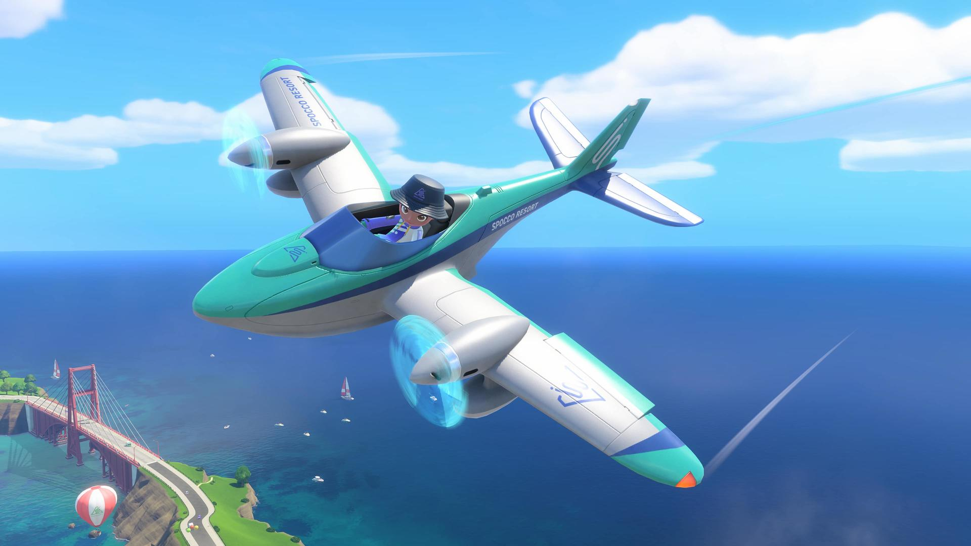 Ein Cartoon-Pilot mit Fischerhut fliegt ein türkisfarbenes und weißes Wasserflugzeug über eine Bucht mit Brücke.