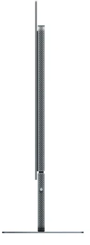 Vékony, szürke Apple Mac Pro perforált mintával, oldalnézet.