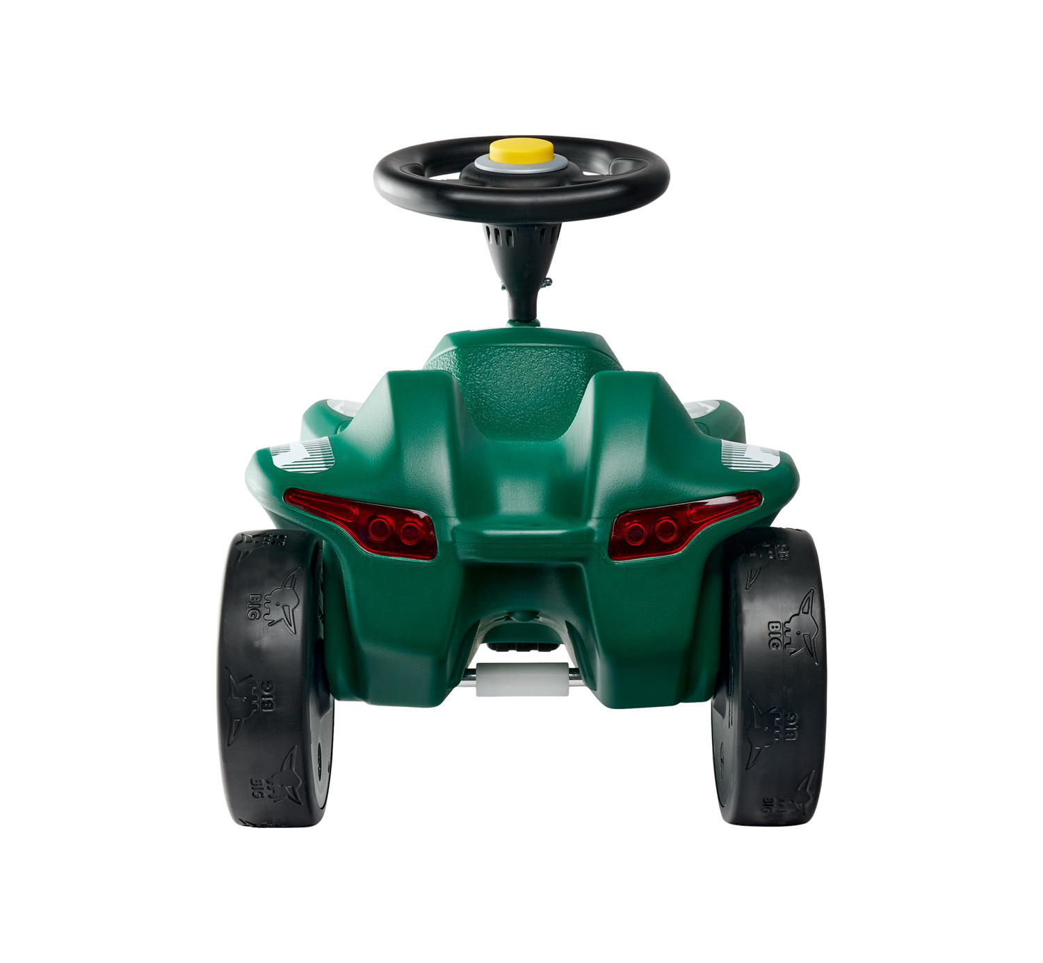 Grünes Kinderfahrzeug mit schwarzem Lenkrad und Reifen mit "BIG"-Aufdruck.