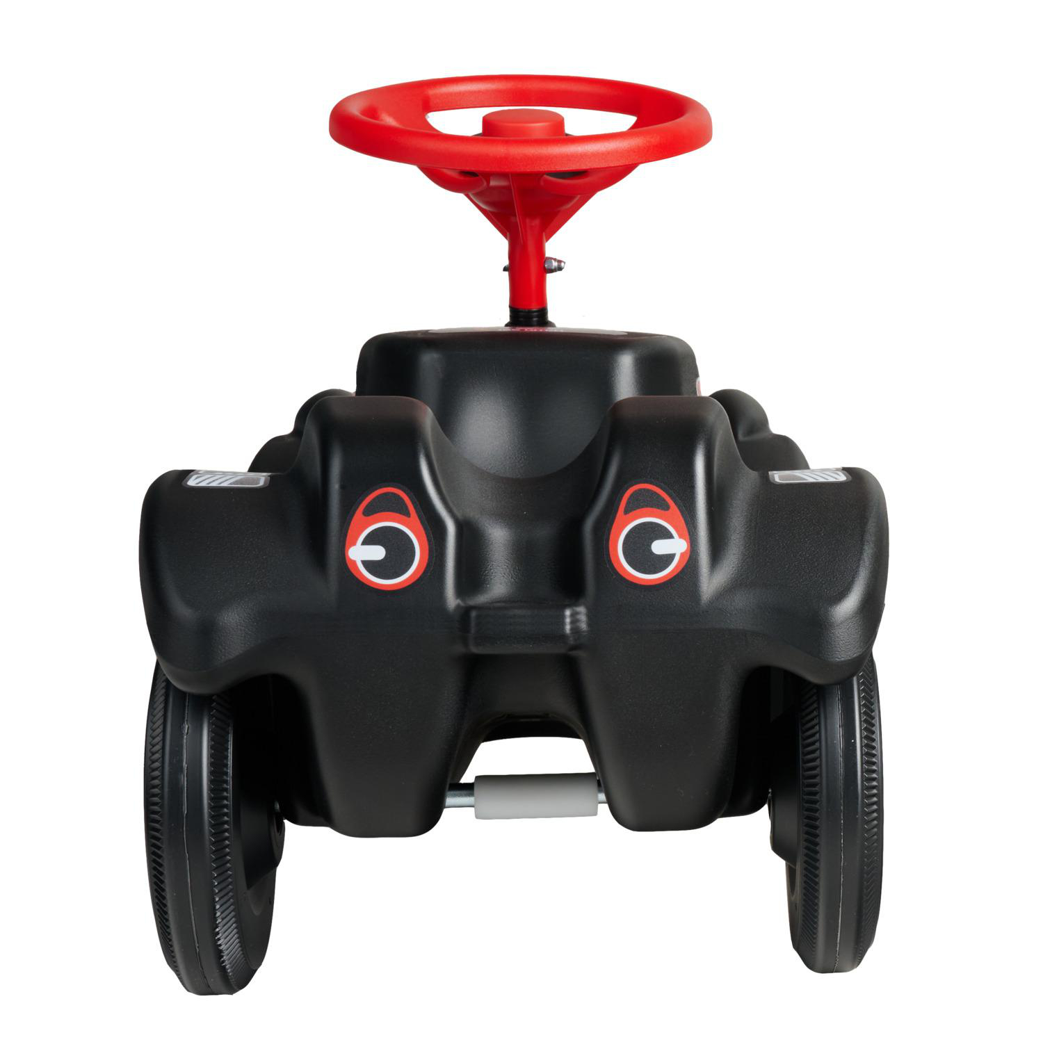 Ein schwarzes Kinderfahrzeug mit rotem Lenkrad und Augenaufklebern.
